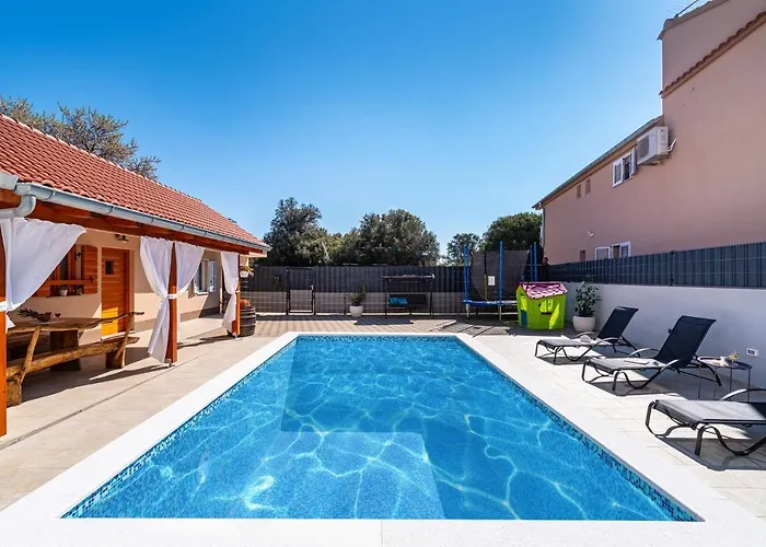 Дом отдыха Family Friendly House With A Swimming Pool Sukosan, Zadar - 17965 *